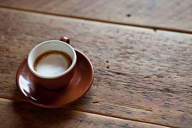 cup of espresso with foam - horizontal stock photo