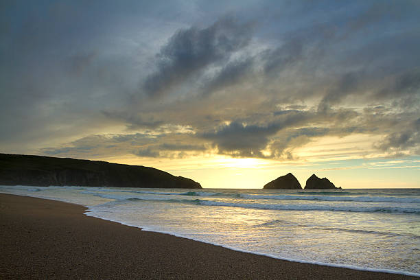istock sunset at holywell bay, newquay UK 187539063