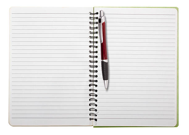 istock used blank note book with ring binder and ball pen 187539636