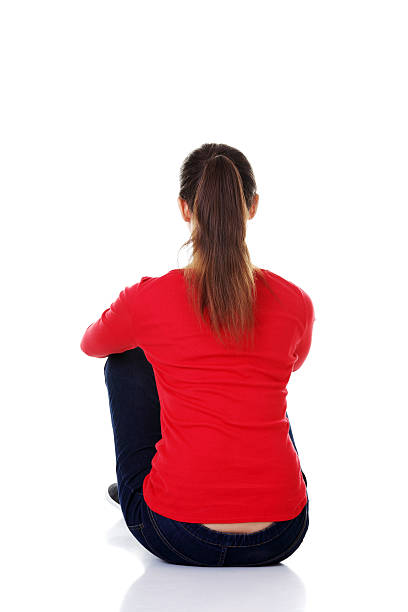 istock Young woman sitting. Back view. 187539779