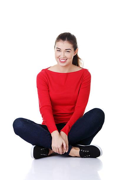 istock Attractive woman sitting and smiling. 187539808