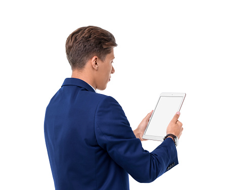 Man holding tablet with blank screen on white background