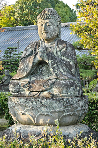 istock Antique Stone Buddha sculpture 187542288