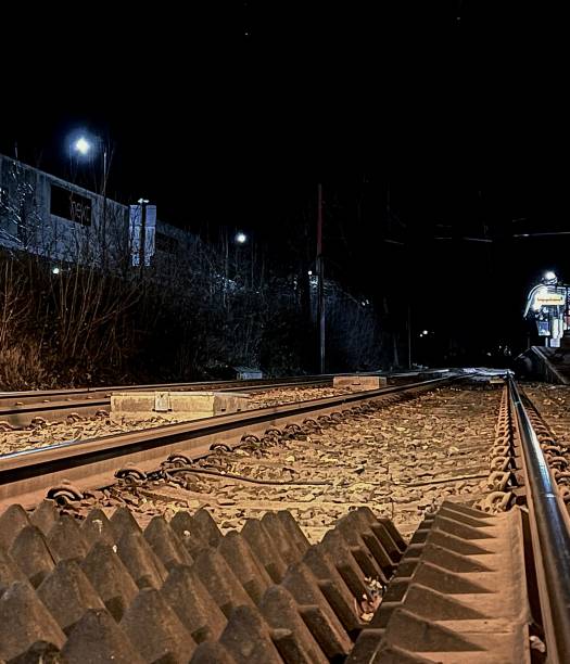 istock Low angle view of railway lines at Newcastle Tyne at night 1875453836