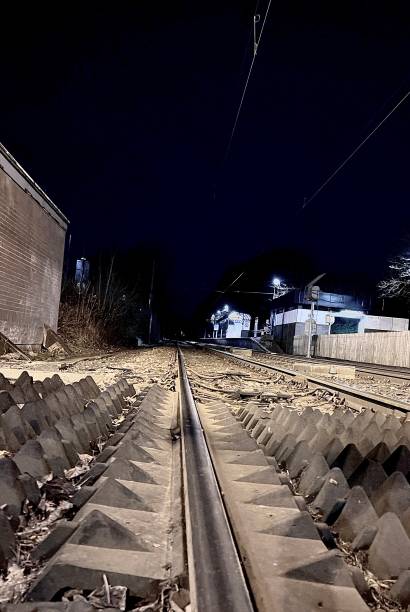 istock Low angle view of railway lines at Newcastle Tyne at night 1875453842