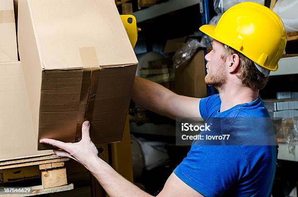 Worker Checking Stocks Stock Photo - Download Image Now - Adult, Blue-collar Worker, Business
