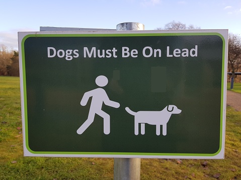 Dogs must be kept on lead information sign, Glasgow Scotland England UK