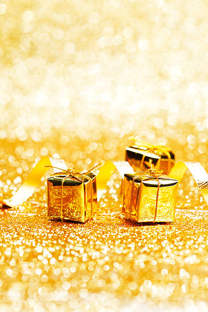 istock Golden gifts and ribbon 187548387