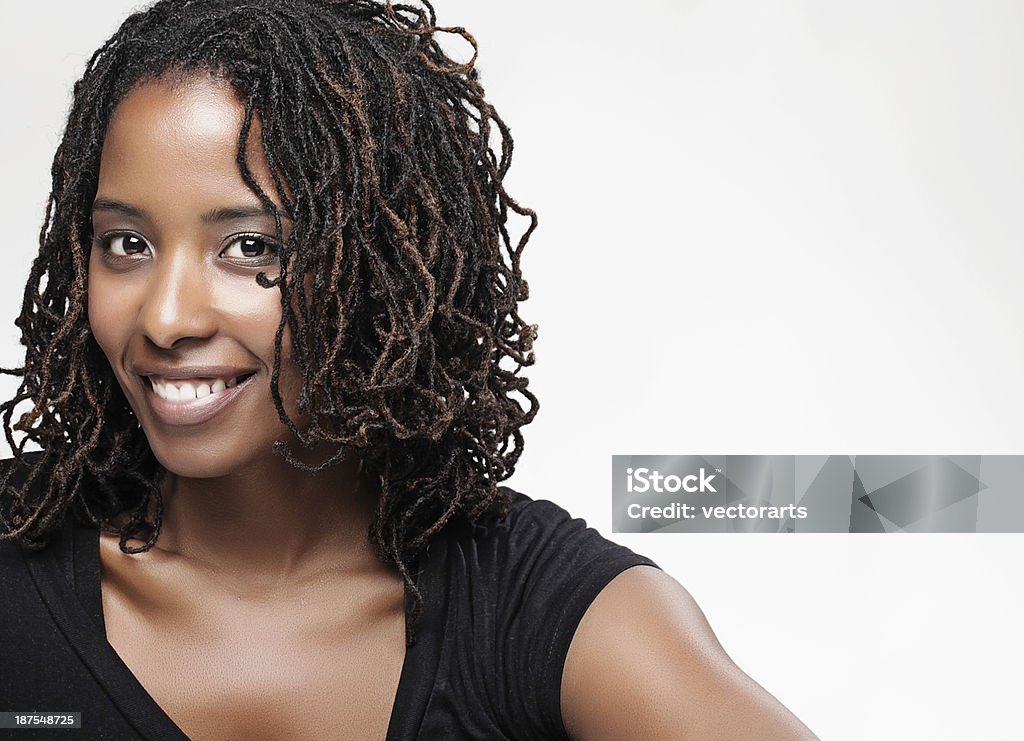 curious pretty black woman looking into the camera Locs - Hairstyle Stock Photo