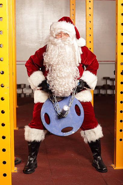 istock Santa Claus  training before Christams time in gym 187551420