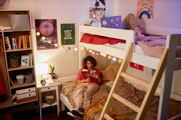 istock Two Female College Students in Dorm Room 1875519119