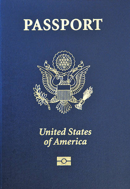 American passport with biometric data in microchip American passport, front cover - US Biometric Passport with imbedded microchip blue us passport cover stock pictures, royalty-free photos & images