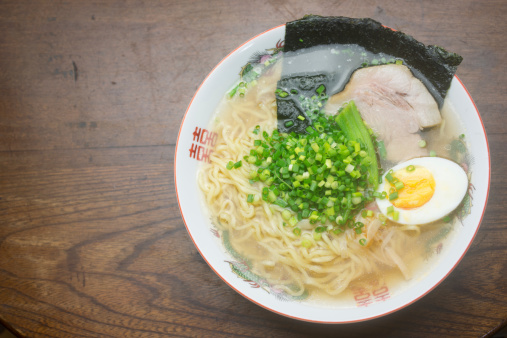 Ramen: thin light yellow noodles served in hot chicken or pork broth with various toppings; of Chinese origin, it is a popular and common item in Japan. Also known as Shina-soba (支那そば) or Chuka-soba (中華そば) (both mean \