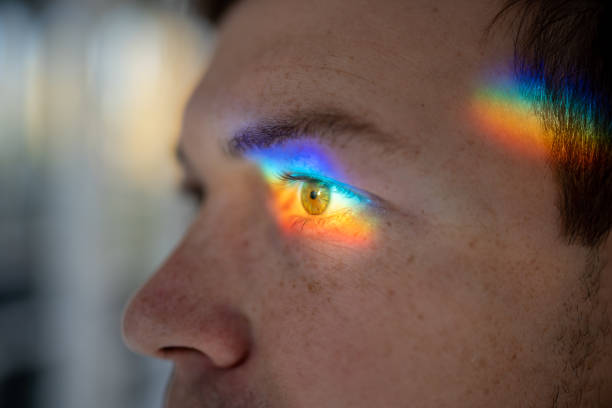 istock Beautiful physical phenomenon created by falling sunlight beam, refracting through optical lens 1875551509