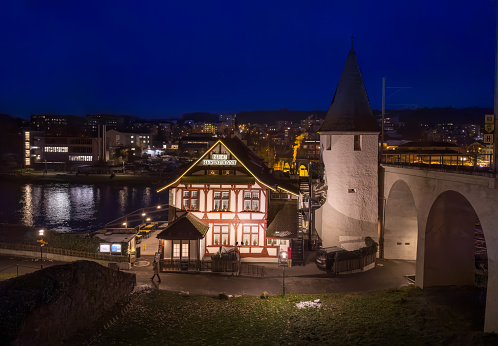 Bremgarten, Switzerland - December 7, 2023: Bijou Restaurant and night time cityscape of Bremgarten, a small town in canton Aargau.