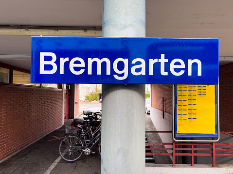 Bremgarten, Switzerland - December 7, 2023: A railway station sign of the small town of Bremgarten in the canton of Aargau in Switzerland.