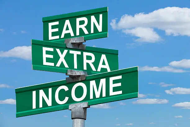 Photo of Earn Extra Income Street Sign