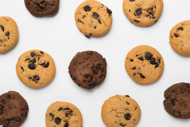 istock Flat lay with chocolate chip cookies on white background 1875574198