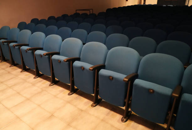 istock first row of seats in an empty theater 1875586484