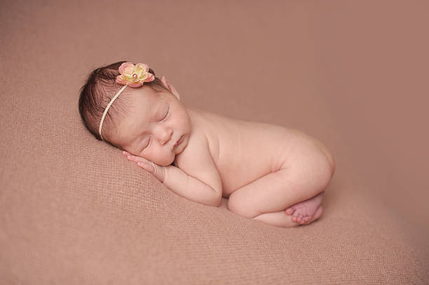 istock Sleeping Newborn Girl 187559579