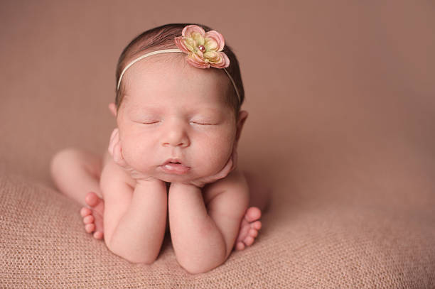 istock Sleeping Newborn Girl 187559605