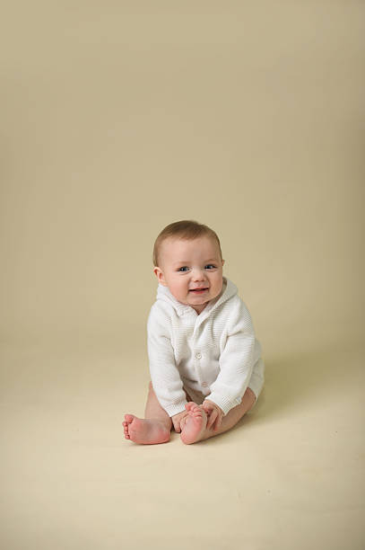 istock Baby Wearing  A cute Sweater 187559625