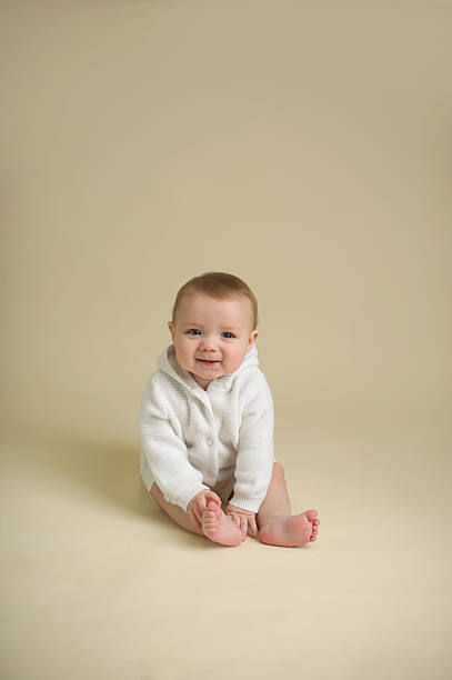 istock Baby Wearing  A cute Sweater 187559746