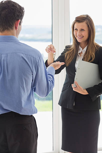 istock Man taking keys to the new house 187561688