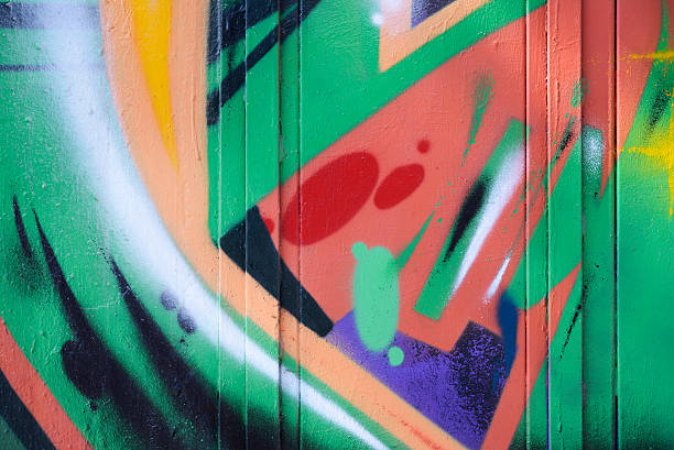 istock Green red graffiti on a concrete wall 187561691