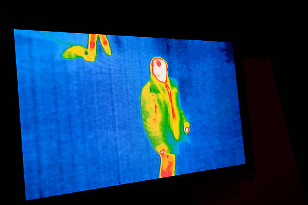 istock Multicolored thermal image of person on blue background 187562482