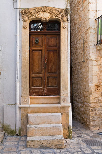 Wooden door. Conversano. Puglia. Italy. Wooden door. Conversano. Puglia. Italy. conversano stock pictures, royalty-free photos & images
