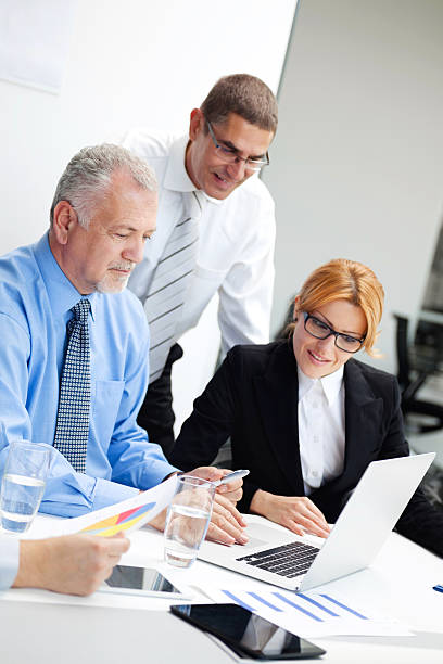 istock Business office leader looking at laptop display. 187563281