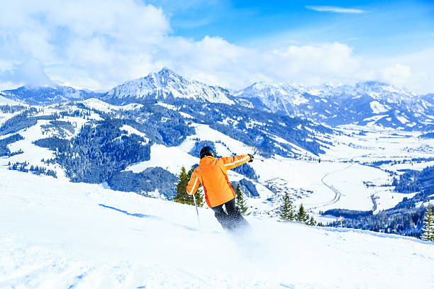 istock senior woman skiing 187563430