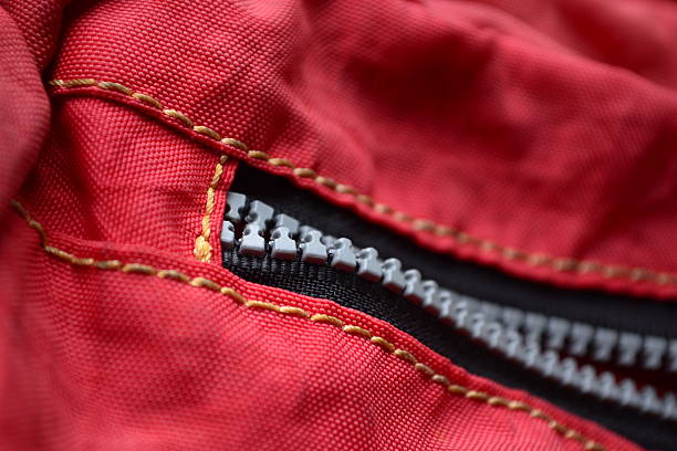 istock vivid red fabric with  Nylon plastic zippers 187563520