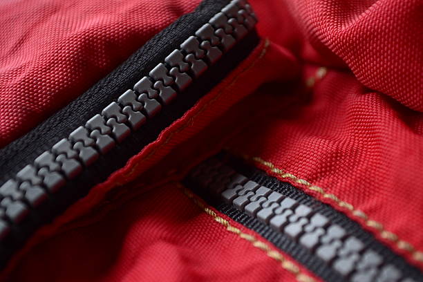 istock vivid red fabric with  Nylon plastic zippers 187563781