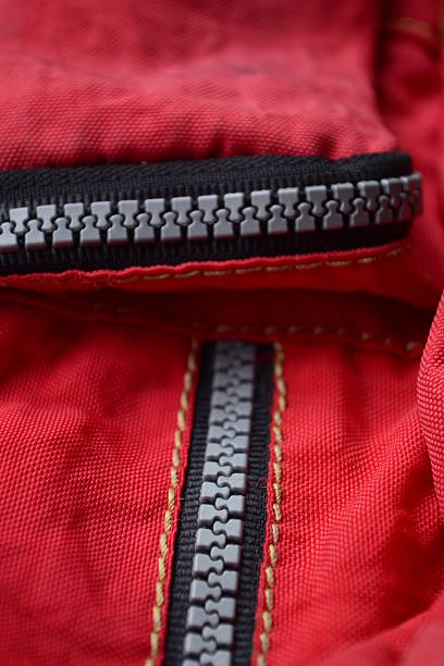 istock vivid red fabric with  Nylon plastic zippers 187563823