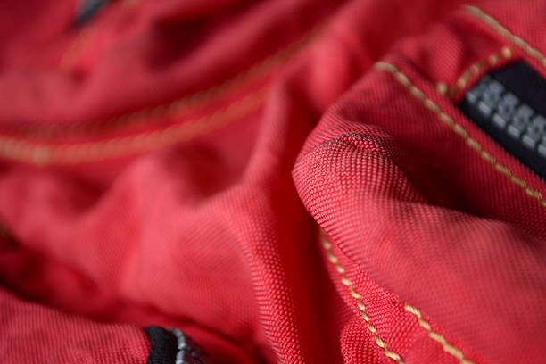 istock vivid red fabric with  Nylon plastic zippers 187563957