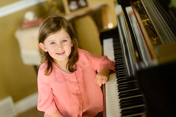 istock Girl at Piano 187564175