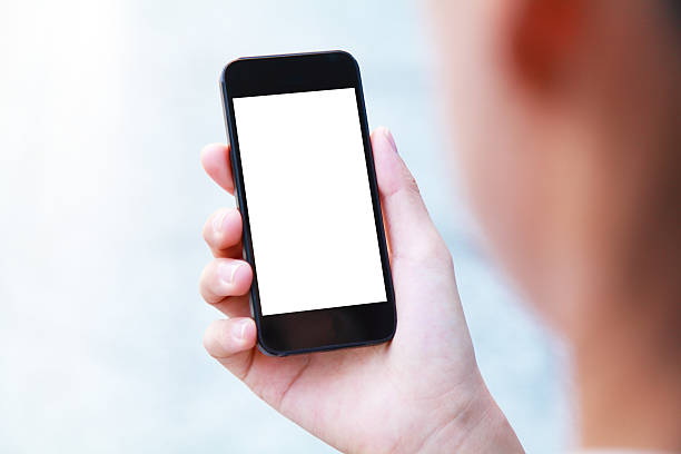 Business people hand holding blank screen smart phone Business people hand holding blank screen smart phone, More multi-view and high-quality similar pictures in my portfolio man looking at phone over shoulder stock pictures, royalty-free photos & images
