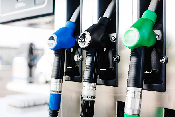 Fuel pumps Fuel pumps at Petrol Station. diesel fuel photos stock pictures, royalty-free photos & images