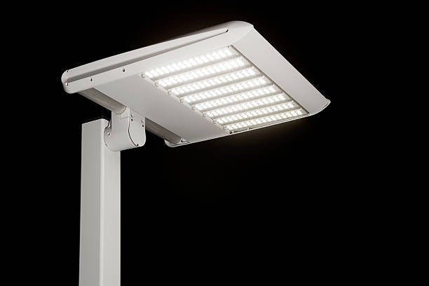 Illuminated LED Streetlight against a Night Sky