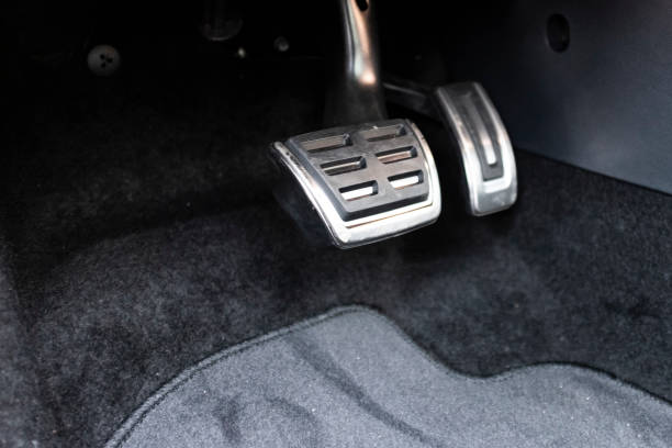istock Brake and throttle aluminium pedals inside a racing car automatic transmission 1875665463