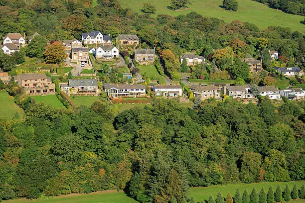 Aerial shot of large detatched houses in Ilkley, near Leeds. 