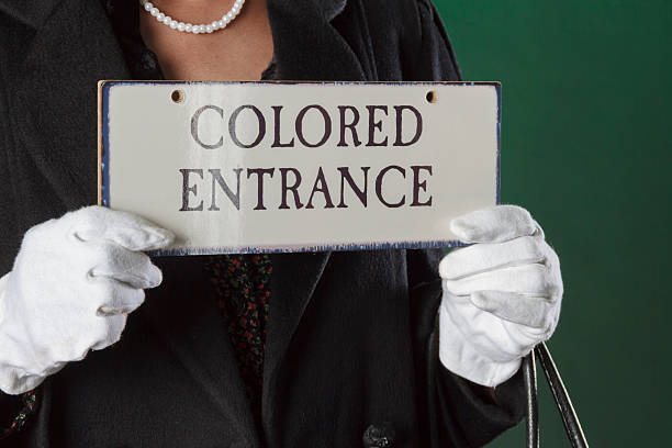 Hands Holding Colored Entrance Sign From the American Fifties stock photo