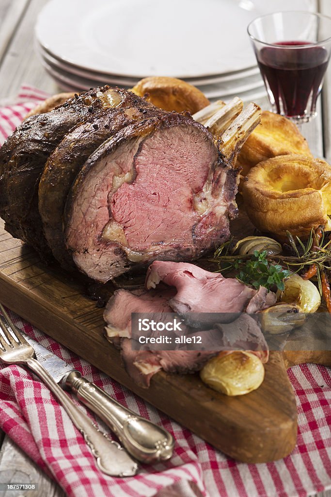 Juicy Roast beef Prime rib roast with Yorkshire pudding and vegetables. Roasted Prime Rib Stock Photo