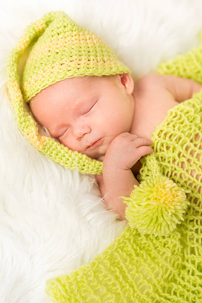 istock Baby In Warm Clothing Sleeping 187571613
