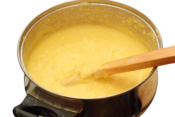 作りポレンタ - polenta cooking food spoon ストックフォトと画像