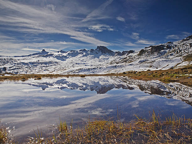 istock Autumnal alpine landscape mirroring in a lake 187575045