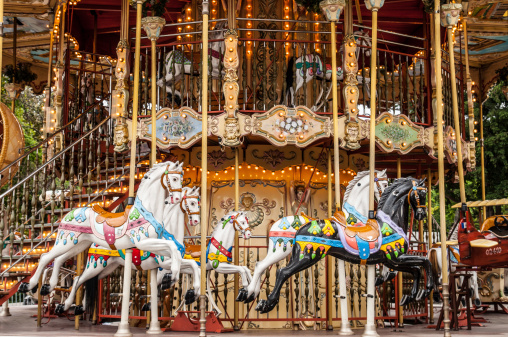 the Ancient  carousel de Paris with horses