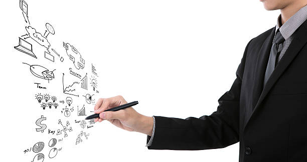 istock Businessman writing business graph against white background 187576699
